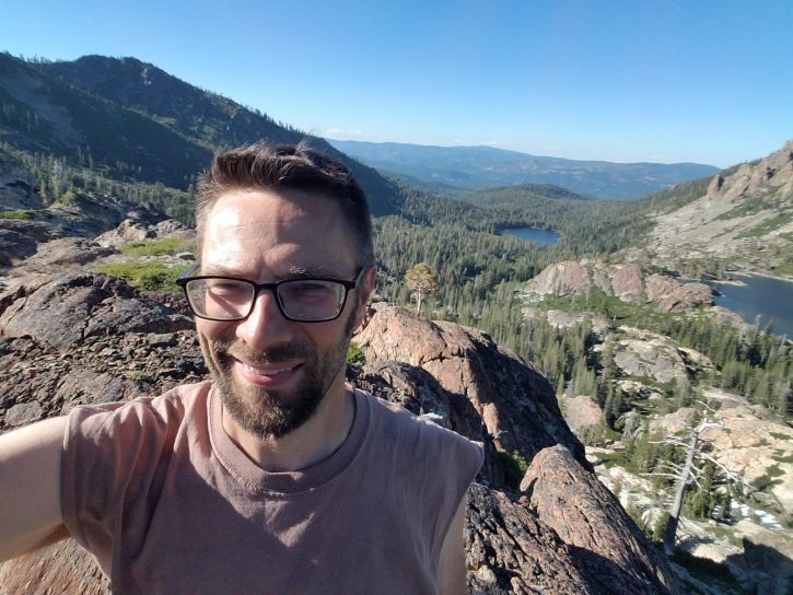 Chris hiking in the mountains